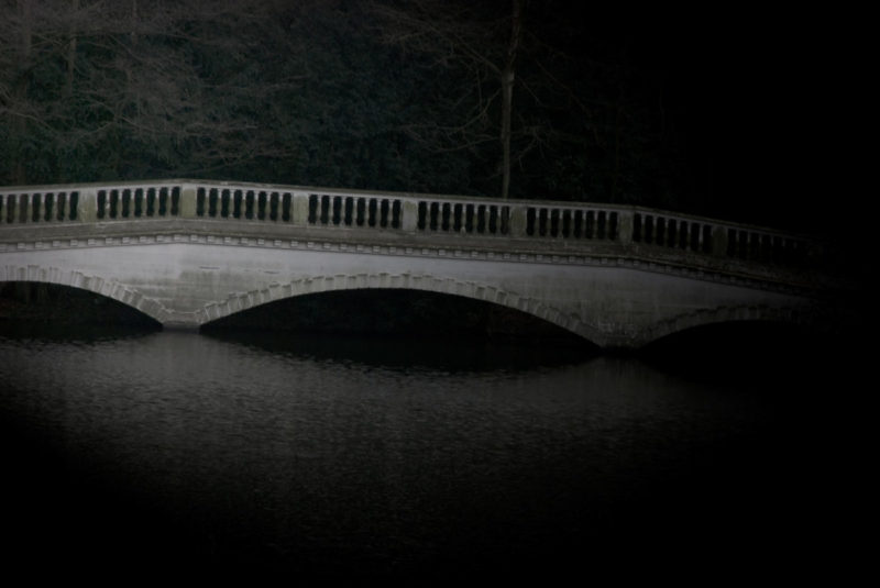 Bridge in Hampstead Heath London Red shoes cinderella fairytale bridge Hamstead Heath London Artist Aldona Kmiec Polish